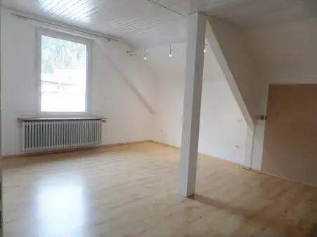 Großzügige Eigentumswohnung mit Dachterrasse in zentraler Lage