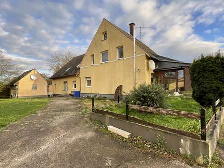 Gartenansicht Wohnhaus - Einfamilienhaus in 32469 Petershagen mit 89m² kaufen