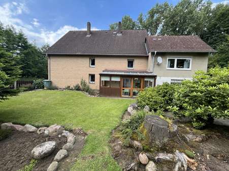 Seitenansicht - Zweifamilienhaus in 32108 Bad Salzuflen mit 177m² kaufen