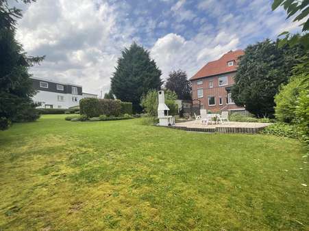 Gartenansicht - Zweifamilienhaus in 32457 Porta Westfalica mit 154m² kaufen