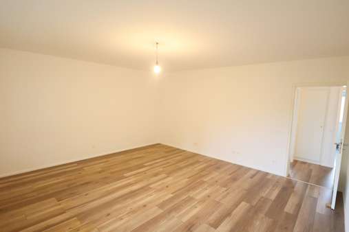Wohnzimmer Bild 2 - Etagenwohnung in 63225 Langen mit 66m² kaufen