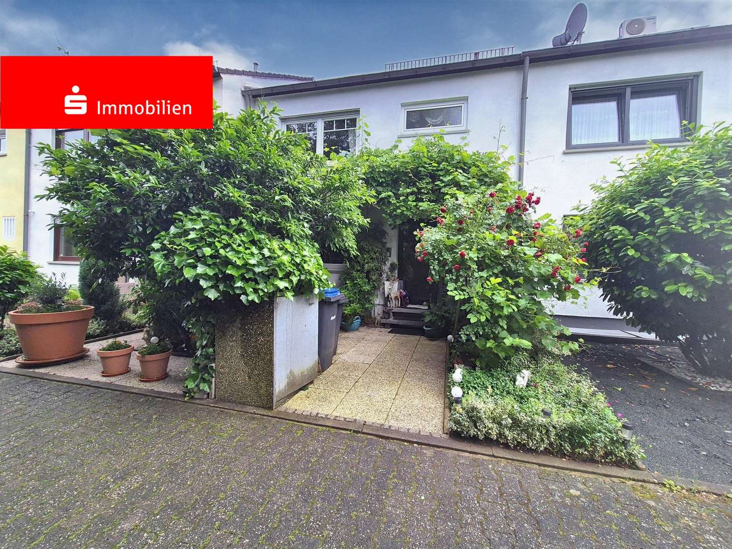 Hausansicht Hausansicht - Reihenmittelhaus in 63263 Neu-Isenburg mit 130m² kaufen