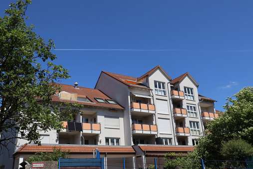 Außenansicht Außenansicht - Etagenwohnung in 63225 Langen mit 65m² kaufen