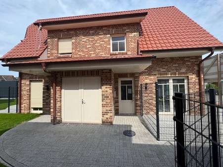 Hausansicht - Maisonette-Wohnung in 26553 Dornum mit 78m² als Kapitalanlage kaufen