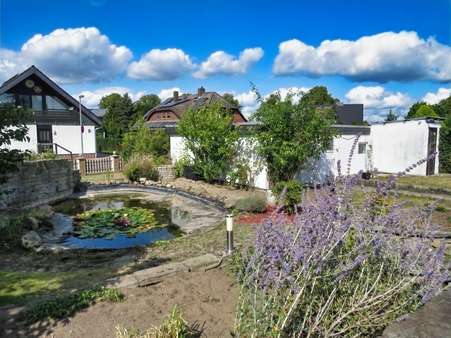 Teich mit Garage und Carport - Einfamilienhaus in 38448 Wolfsburg mit 147m² kaufen