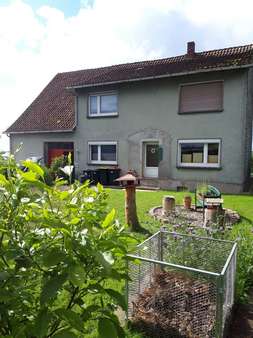 Blick von der Straße - Zweifamilienhaus in 31737 Rinteln mit 180m² kaufen