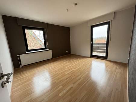 Wohnzimmer - Etagenwohnung in 49124 Georgsmarienhütte mit 75m² kaufen