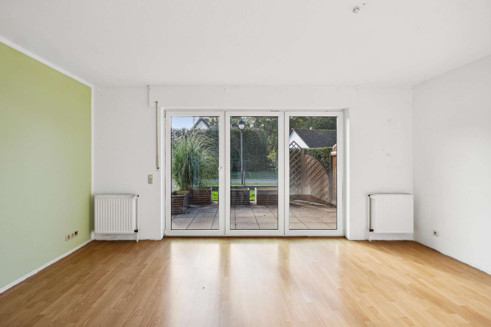 DHH1_Wohnzimmer - Zweifamilienhaus in 49448 Brockum mit 172m² kaufen