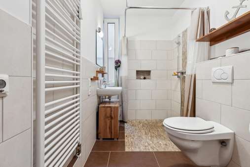 Badezimmer  - Erdgeschosswohnung in 49084 Osnabrück mit 115m² kaufen