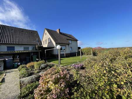 Gartenansicht - Einfamilienhaus in 49328 Melle mit 150m² kaufen