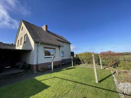 Gartenansicht - Einfamilienhaus in 49328 Melle mit 150m² kaufen