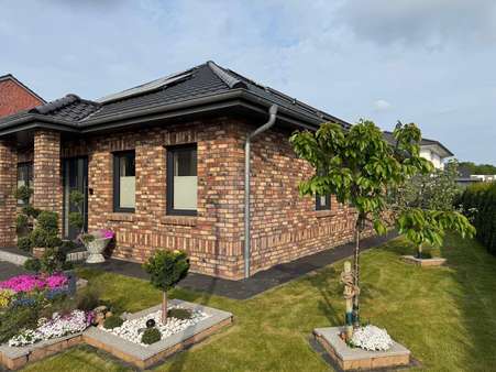seitliche Ansicht - Bungalow in 21684 Stade mit 120m² kaufen