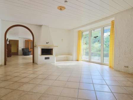 Wohnbereich mit Kamin Wohnbereich mit Kamin - Bungalow in 38685 Langelsheim mit 116m² kaufen