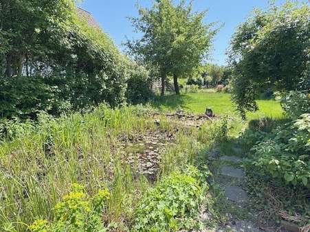 Garten mit Teich Garten mit Teich - Einfamilienhaus in 30419 Hannover mit 174m² kaufen