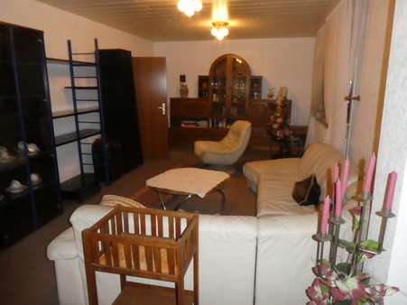 Wohnzimmer im Erdgeschoss - Einfamilienhaus in 32278 Kirchlengern mit 180m² kaufen