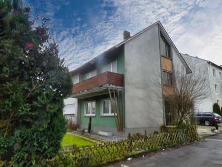 Seitenansicht - Zweifamilienhaus in 32257 Bünde mit 152m² kaufen