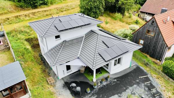 Luftaufnahme - Einfamilienhaus in 36396 Steinau mit 119m² kaufen