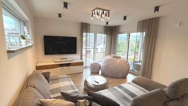 Wohnzimmer - Einfamilienhaus in 36396 Steinau mit 119m² kaufen
