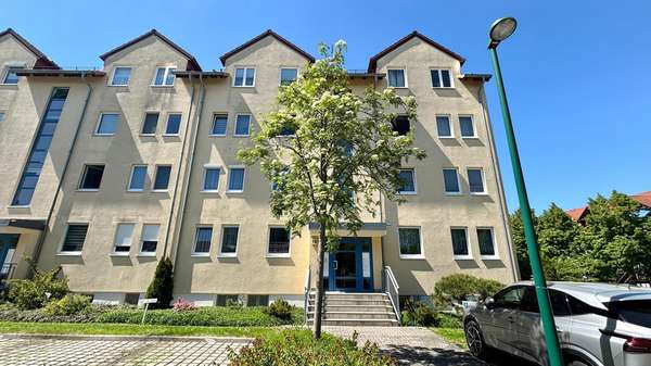 Vorderansicht - Erdgeschosswohnung in 04329 Leipzig mit 90m² als Kapitalanlage kaufen