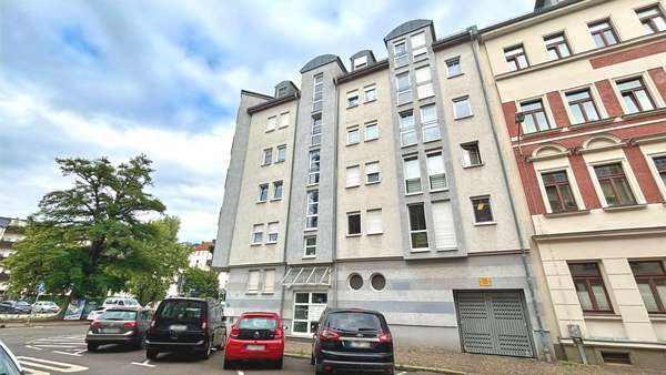 Außenansicht + TG-Einfahrt - Etagenwohnung in 04229 Leipzig mit 76m² kaufen