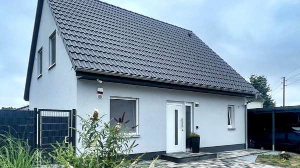 Ansicht - Einfamilienhaus in 06774 Muldestausee mit 116m² kaufen