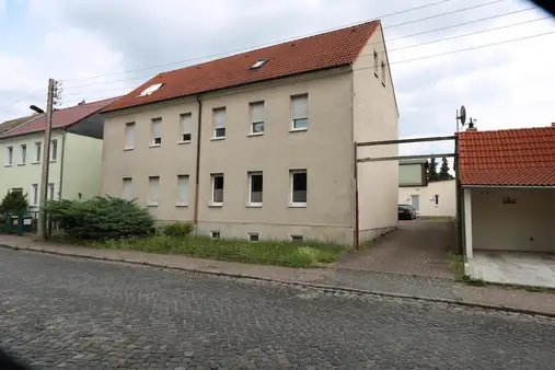 Charmantes Mehrfamilienhaus mit Hinterhaus Holzhausen!