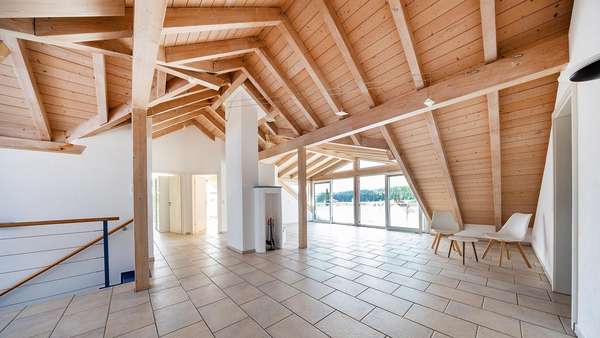 Wohnbereich mit Ofen Wohnbereich mit Ofen - Maisonette-Wohnung in 78315 Radolfzell mit 105m² kaufen