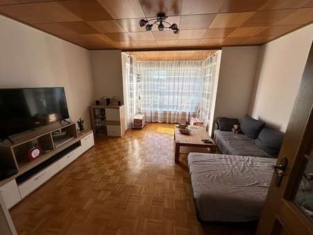 Wohnzimmer im Erdgeschoss Wohnzimmer im Erdgeschoss - Zweifamilienhaus in 48317 Drensteinfurt mit 190m² kaufen