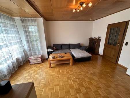 Wohnzimmer im Erdgeschoss Wohnzimmer im Erdgeschoss - Zweifamilienhaus in 48317 Drensteinfurt mit 190m² kaufen