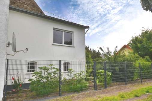 Seitenansicht Seitenansicht - Einfamilienhaus in 56294 Gappenach mit 142m² kaufen