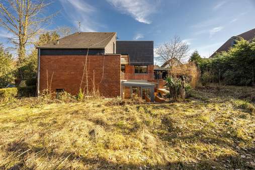 Außenansicht mit Garten - Zweifamilienhaus in 58730 Fröndenberg mit 180m² kaufen