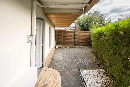 Eingang hinten mit kleiner Terrasse - Einfamilienhaus in 58119 Hagen mit 125m² kaufen