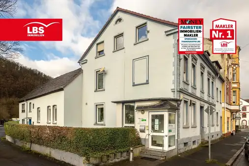 7-Parteien Mehrfamilienhaus mit Arztpraxis und 4 Garagen zum Faktor 10,2