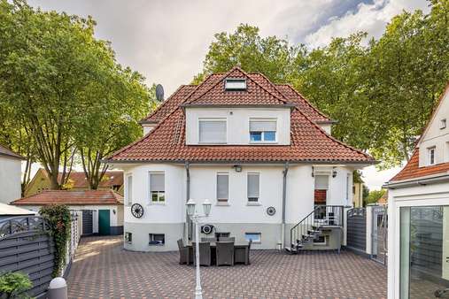 Außenansicht, Garten-/Terrassenseite - Zweifamilienhaus in 46238 Bottrop mit 138m² kaufen