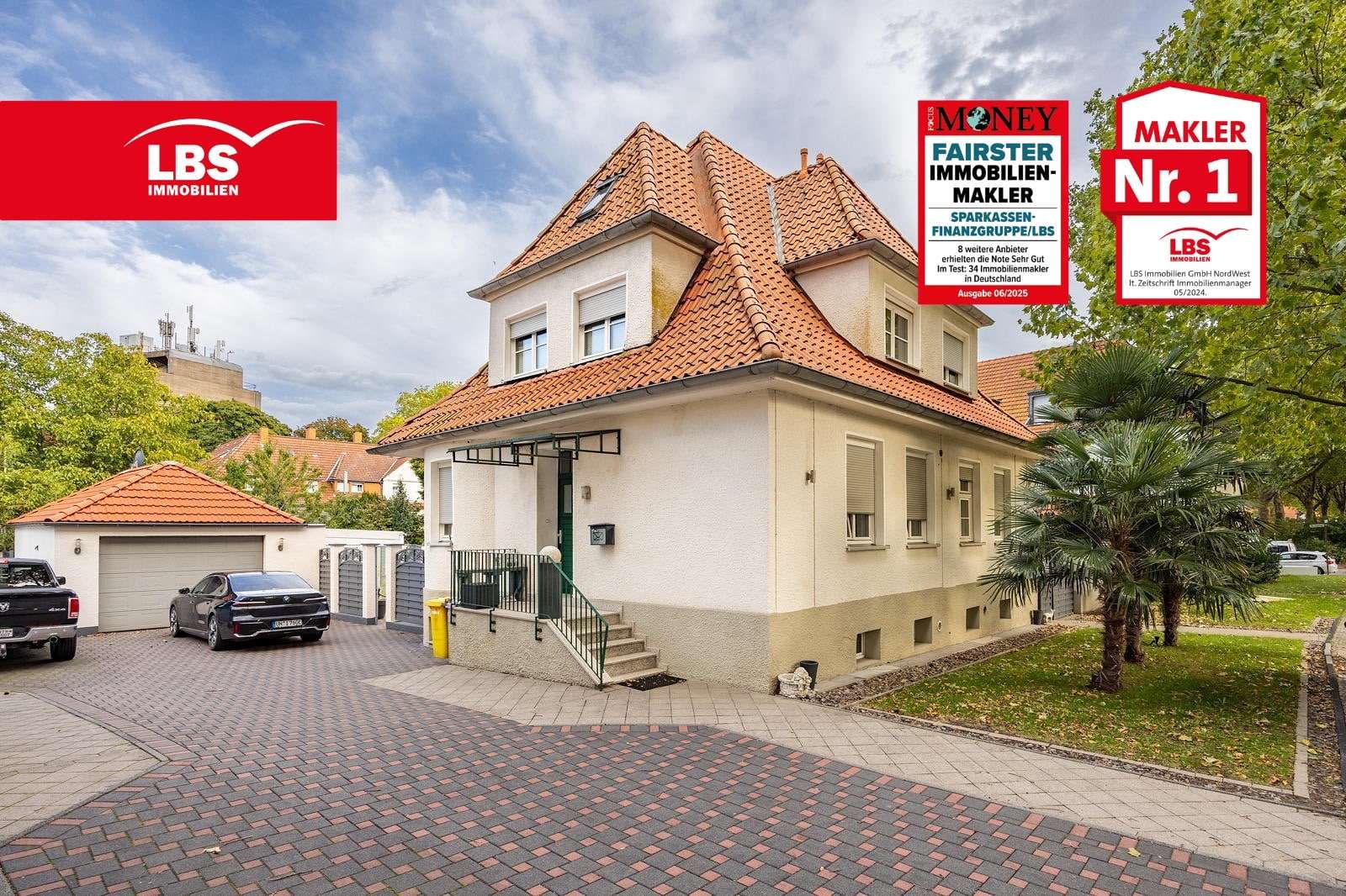 Außenansicht mit Garage und Einfahrt - Zweifamilienhaus in 46238 Bottrop mit 138m² kaufen