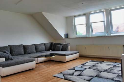 Wohnzimmer - Dachgeschosswohnung in 32832 Augustdorf mit 64m² kaufen