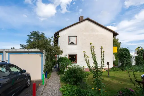 Eckgrundstück in Top Lage – Einfamilienhaus mit Potential