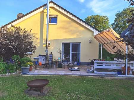 Hausansicht Gartenseite - Bungalow in 15326 Wulkow mit 108m² kaufen