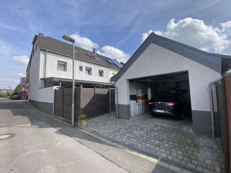 Garage ( Rückansicht ) - Reihenendhaus in 47877 Willich mit 135m² kaufen