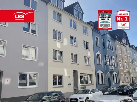 Kapitalanlage mit Potenzial: 8 WE + vermietete Praxis im EG