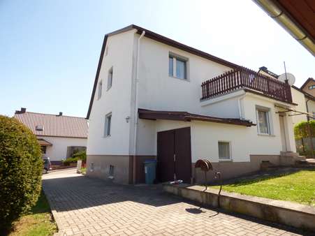rückwärtige Ansicht mit Zugang zum Keller - Einfamilienhaus in 98693 Ilmenau mit 114m² kaufen