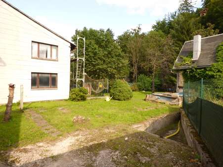 Blick hinter dem Haus Blick hinter dem Haus - Einfamilienhaus in 99331 Geratal mit 100m² kaufen
