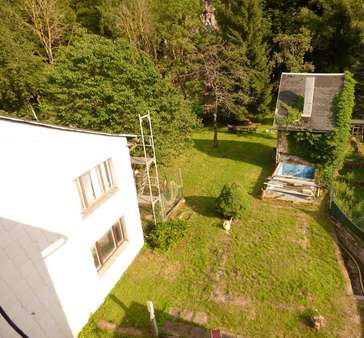Blick ins Grundstück hinter dem Haus Blick ins Grundstück hinter dem Haus - Einfamilienhaus in 99331 Geratal mit 100m² kaufen