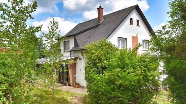 Blick zum Haus - Einfamilienhaus in 35789 Weilmünster mit 174m² kaufen