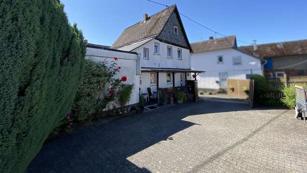 Außenansicht Außenansicht - Einfamilienhaus in 65614 Beselich mit 112m² kaufen