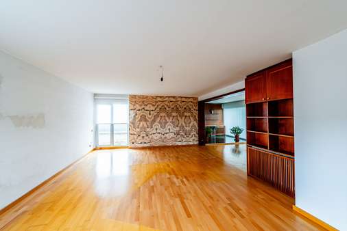 Wohnzimmer - Penthouse-Wohnung in 60437 Frankfurt mit 110m² kaufen