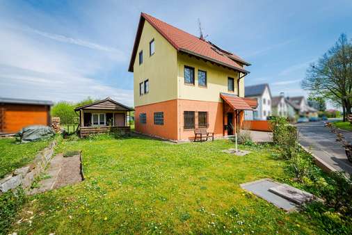 Außenansicht Außenansicht - Einfamilienhaus in 61352 Bad Homburg mit 139m² kaufen