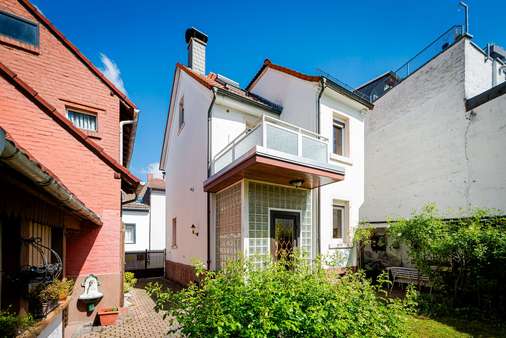 Haus Rückansicht Haus Rückansicht - Einfamilienhaus in 60388 Frankfurt mit 120m² kaufen