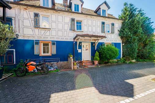 Außenansicht - Erdgeschosswohnung in 60437 Frankfurt mit 52m² kaufen
