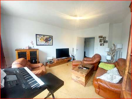 Wohnzimmer - Etagenwohnung in 76133 Karlsruhe mit 66m² kaufen